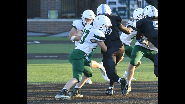 RYLIN BARGERON (#13) was credited with a 4 yard reception and 2 tackles in last week’s loss to Detroit Voyageur Prep.
