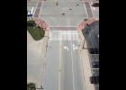 THIS AERIAL VIEW of 5th Street at Mabel Street, looking west, shows the new markings on 5th. It also makes obvious the disparity in lane widths between the left turn lane and the through/right turn lane. --Journal Photo