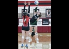 ADRIENNE RAU (#7) goes for a kill against St. Louis last Wednesday.