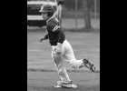 ALEX RIVARD (#1) strolls into second on a wild pitch in last Tuesday’s second game against Meridian.   