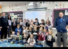 LINWOOD ELEMENTARY 3RD GRADE (left), Books delivered by Rotarians David Tokarsky, Nate Pepple, and Ryan Meissner. --Courtesy Photo