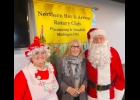 Chris Houle (center) presented to Rotarians about Mediation and special attendees were Santa and Mrs. Claus. --Courtesy Photo