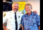Saginaw County Sheriff Bill Federspiel (left) and Rotarian Bob Charlebois. --Courtesy Photo