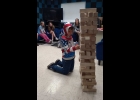It takes a steady hand and a bit of strategy for Graham, Pinconning Boys & Girls Club member, not to tumble over the Giant Jenga game. 