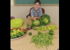 Our garden continues to grow as our members harvest and care for the tomatoes, peppers, pumpkins, and lots and lots of beans! --Courtesy Photo
