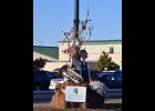 PINCONNING AREA SCHOOL DISTRICT was selected as the winner of the Pinconning & Linwood Area Chamber of Commerce Light Pole Decorating Contest for this year for their pole (above) depicting Fall activities within the District. They were presented a plaque and Monday’s School Board Meeting. --Journal Photo