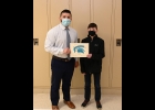 TREVIN BILLINGSLY receives his award as Middle School Student Spartan of the Month from Principal Kyle Woodruff. In nominating Trevin, Mr. Floyd said, “Trevin is a 6th grader in 7th grade PE. He is the hardest worker, is mature and dependable. He participates every day, shows effort and is a pleasure to have in class. He is a good role model for the 7th grade boys.” --Journal Photo