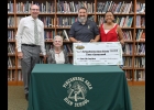 THE PENNY MARTIN EDUCATION SCHOLARSHIP will be awarded annually to a PHS student pursuing a degree in education. Pictured are (l-r): Superintendent Andy Kowalczyk, Penny Martin, Nick Hetherington, and Marilia Hetherington.