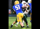 Max Meehleder (#64) defends against the pass rush on Friday night at Harrison.